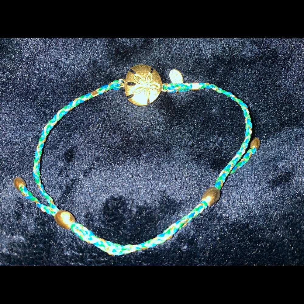 Alex and Ani sand dollar string bracelet.